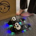 👣👣Cute slippers with cartoon motifs that glow